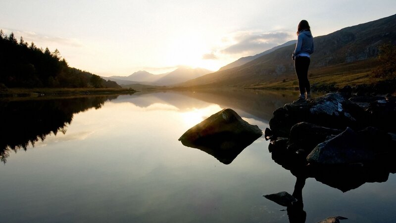Person Standing on Rocks — Blue, Serene