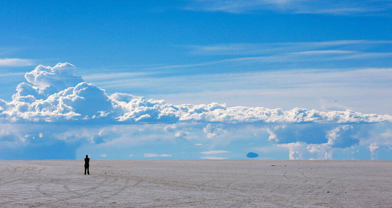 Person Standing on Salt Flat — Blue
