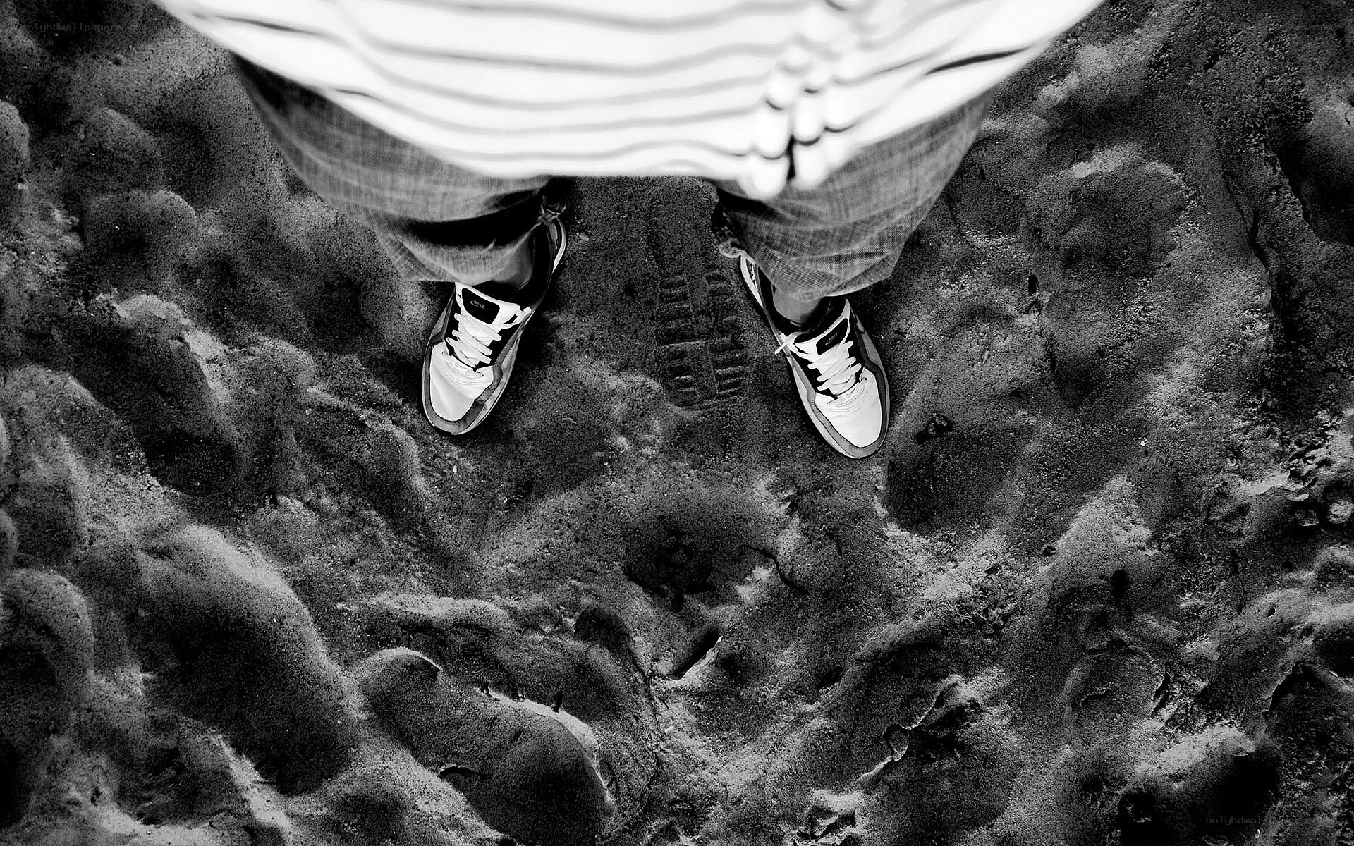 person standing on sand