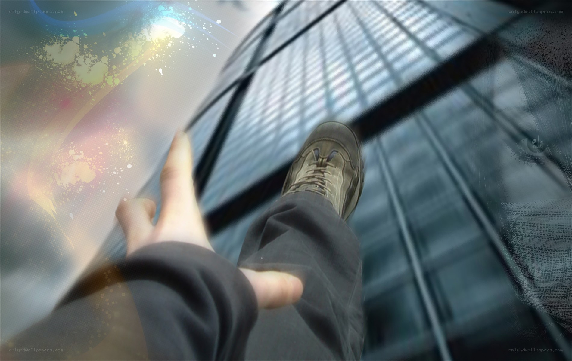 person standing on skyscraper edge