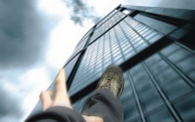 Person Standing on Skyscraper