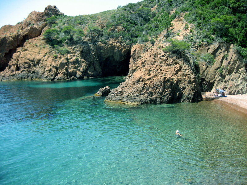 Person Swimming in Cove