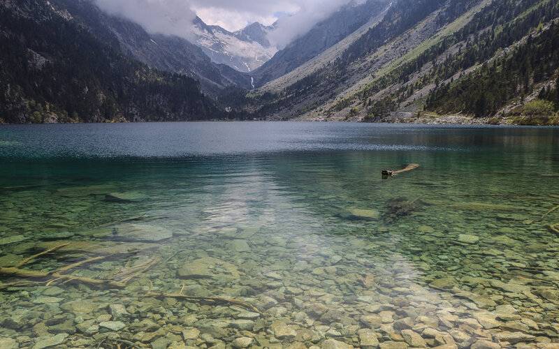 Person Swimming in Lake — Blue