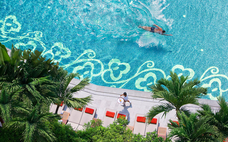 Person Swimming in Pool — Blue