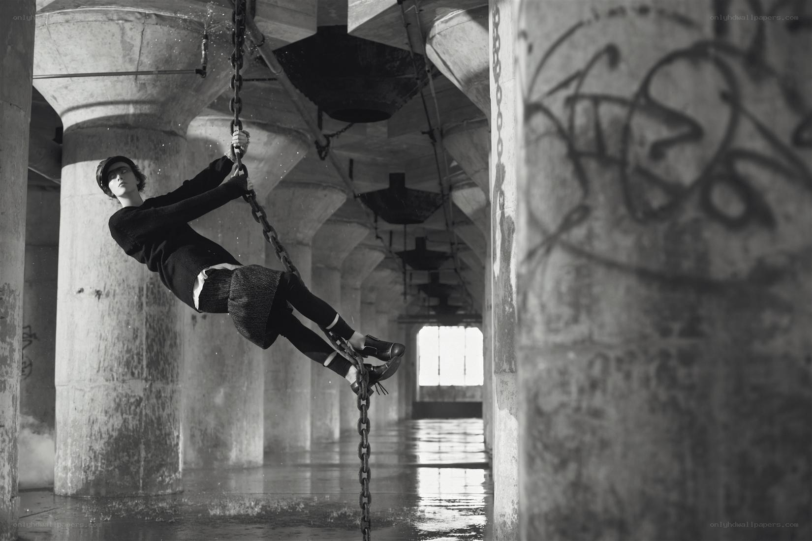 Person swinging on a chain