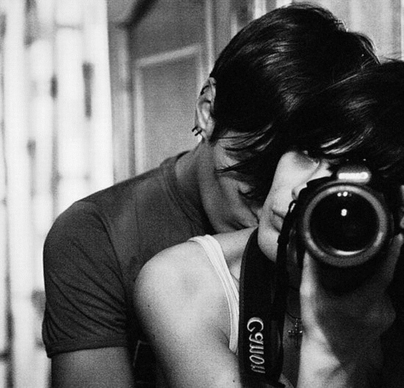 Person Taking a Photo — Black