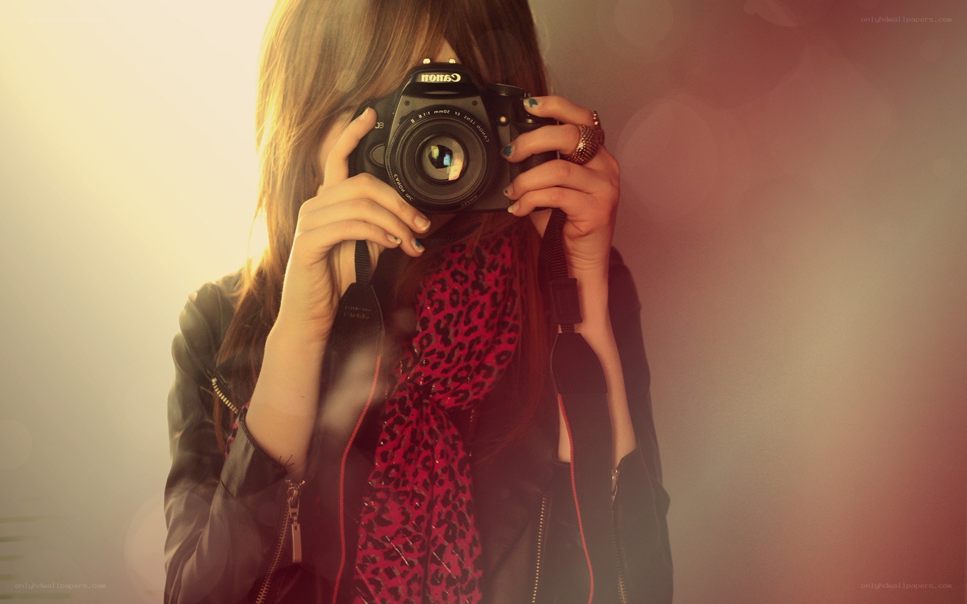 person taking a photo with camera