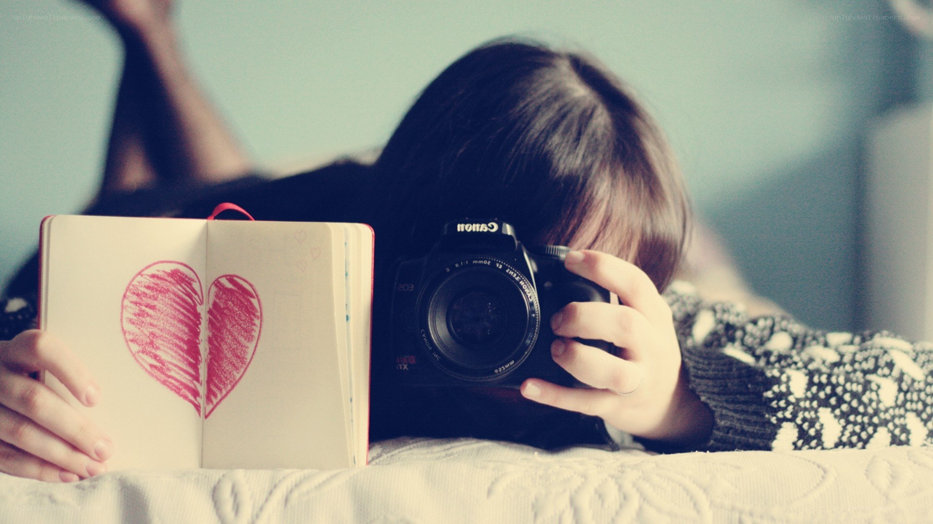 person taking a photo with camera