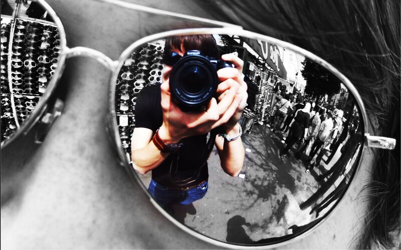 Person Taking Mirror Selfie — Black, Reflective, Afternoon