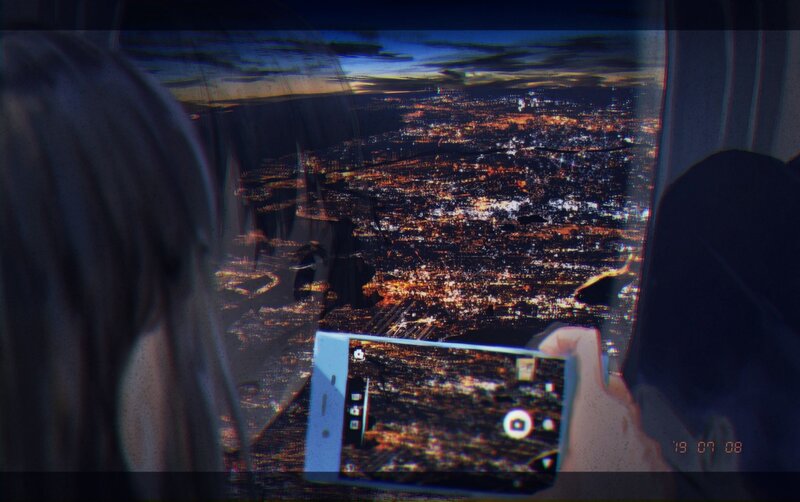 Person Taking Photo from Airplane