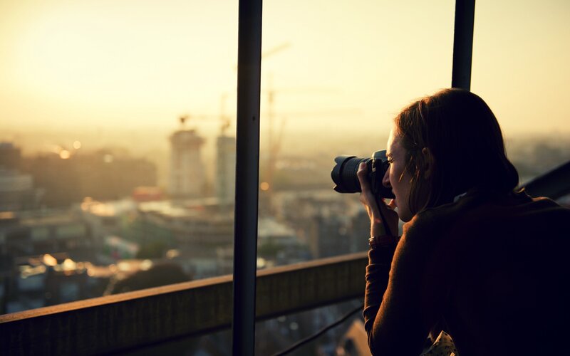 Person Taking Photo — Golden
