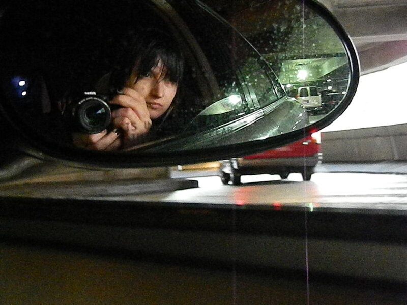 Person Taking Photo in Mirror