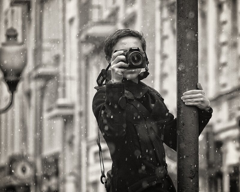 Person Taking Photo in Snow — Black
