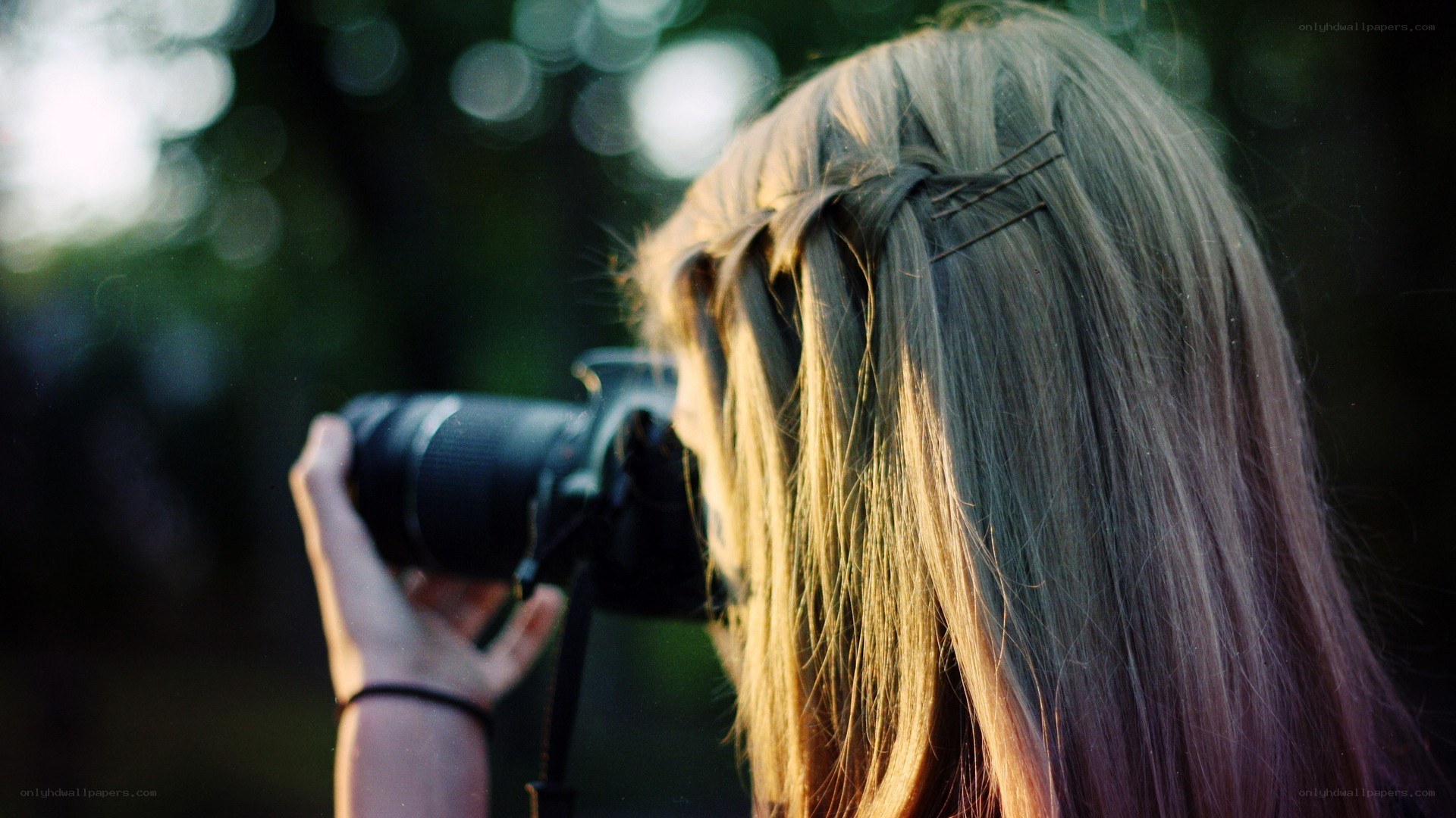 person taking photo outdoors