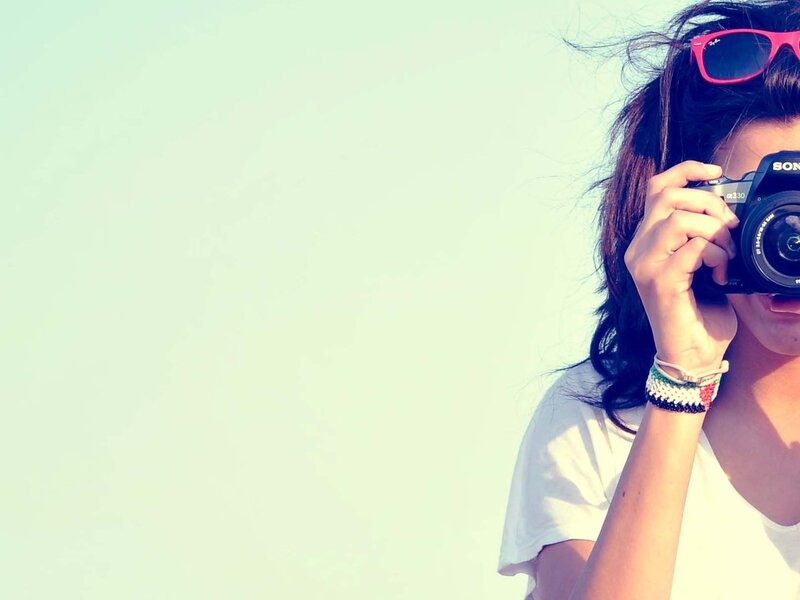 person taking photo with camera