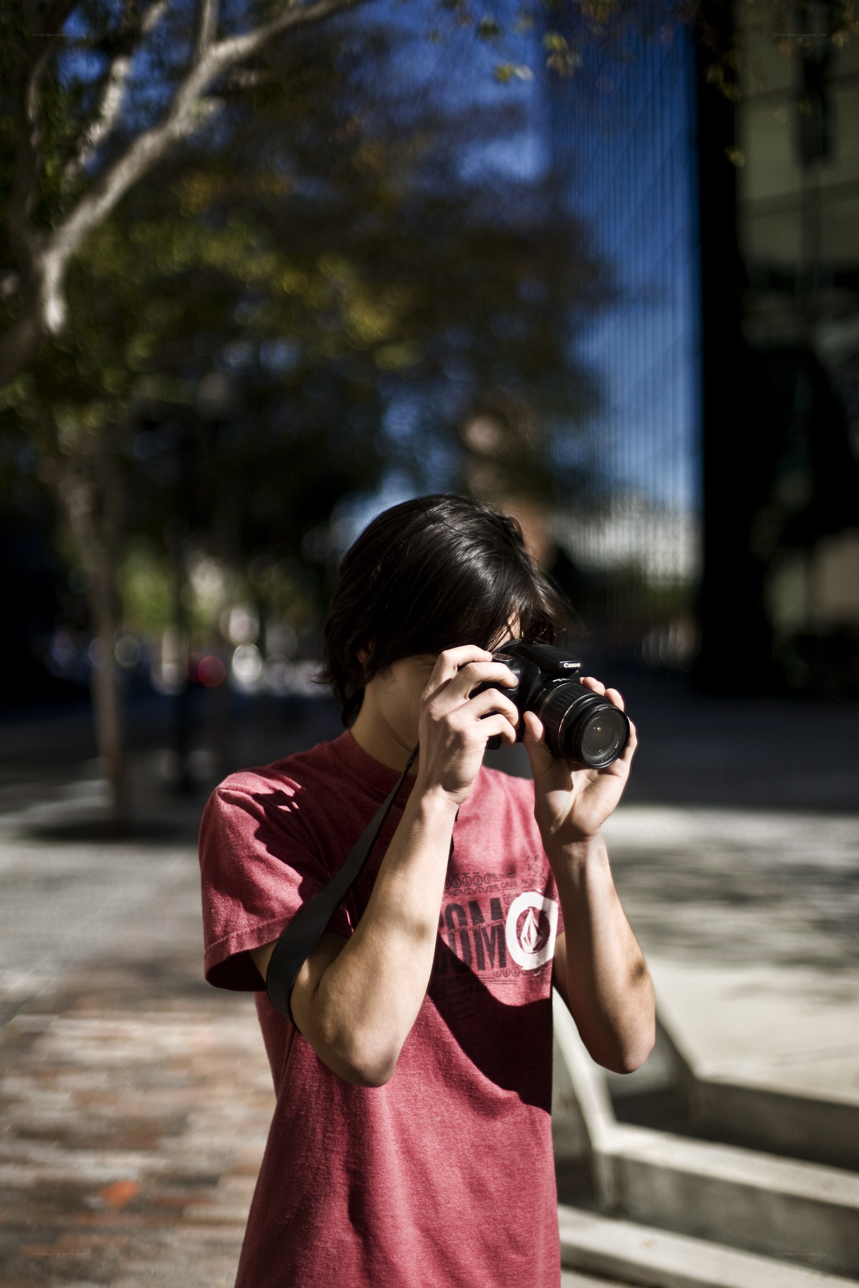 person taking photo with camera
