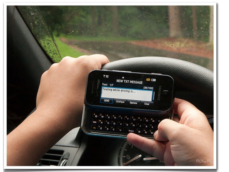 Person Texting in Car