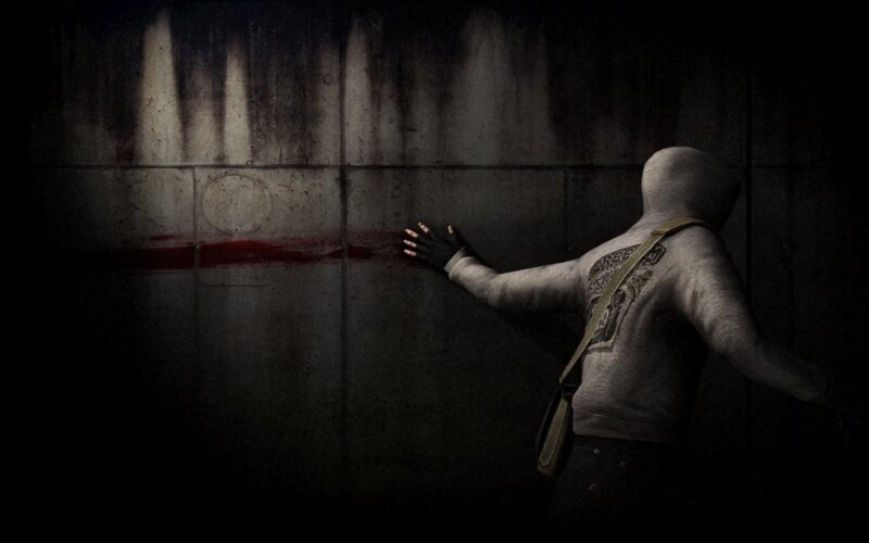 person touching blood-stained wall