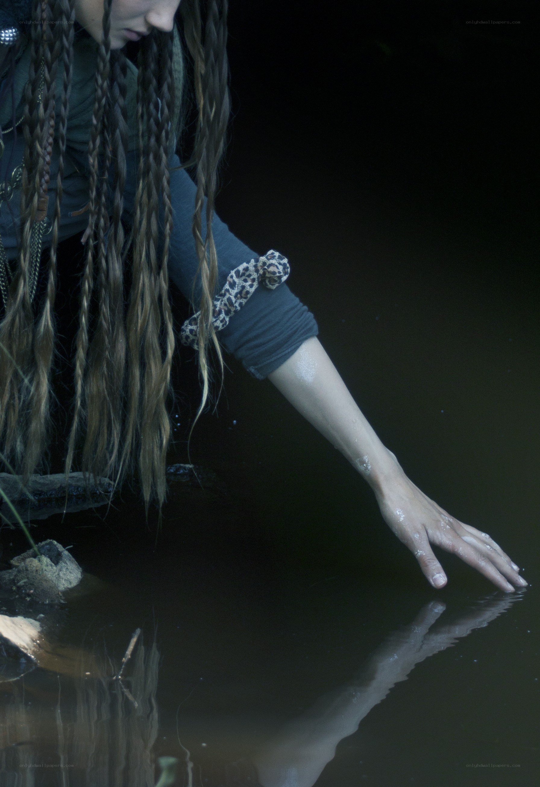person touching water