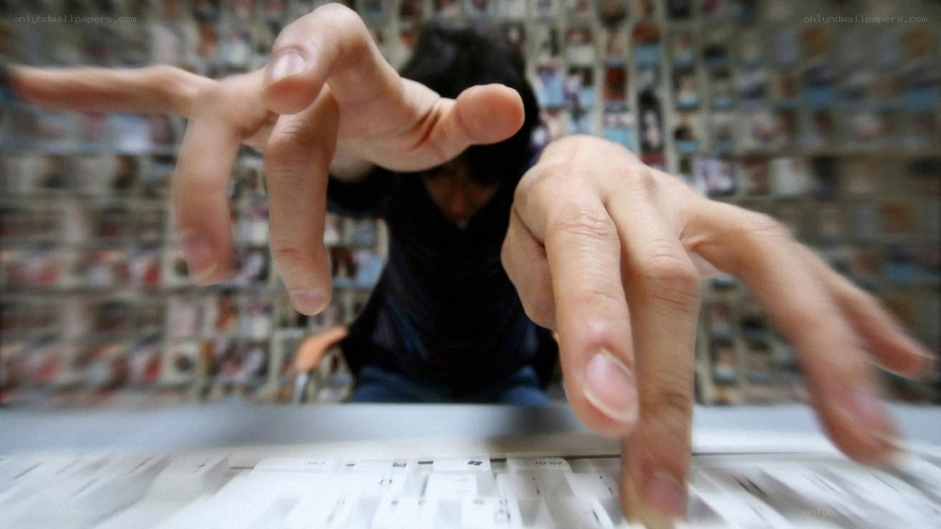 Person typing on keyboard