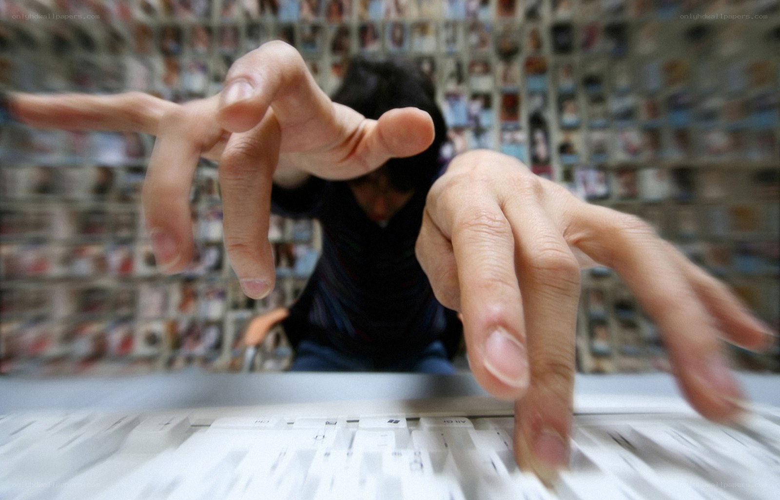 Person typing on keyboard