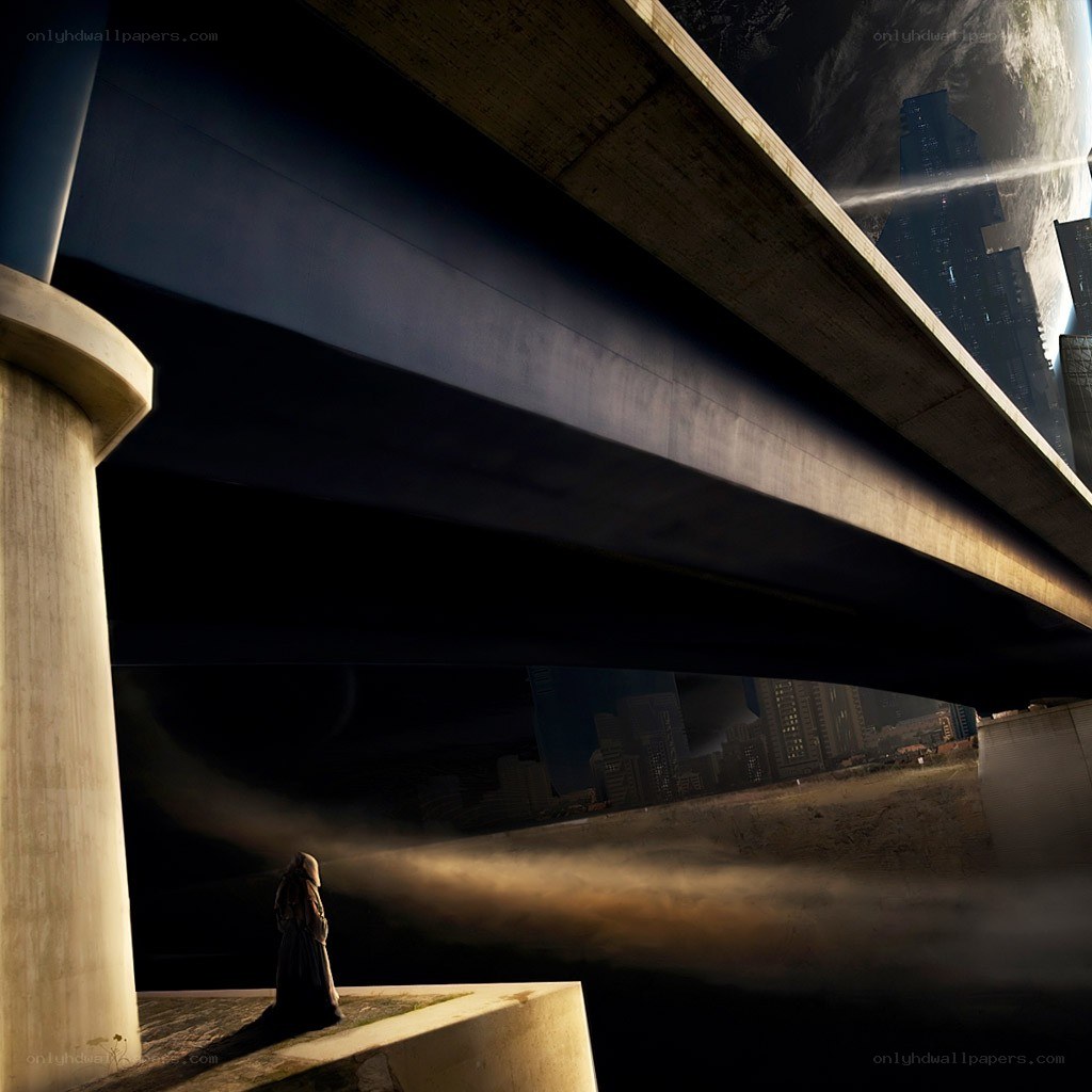 Person under a bridge at night