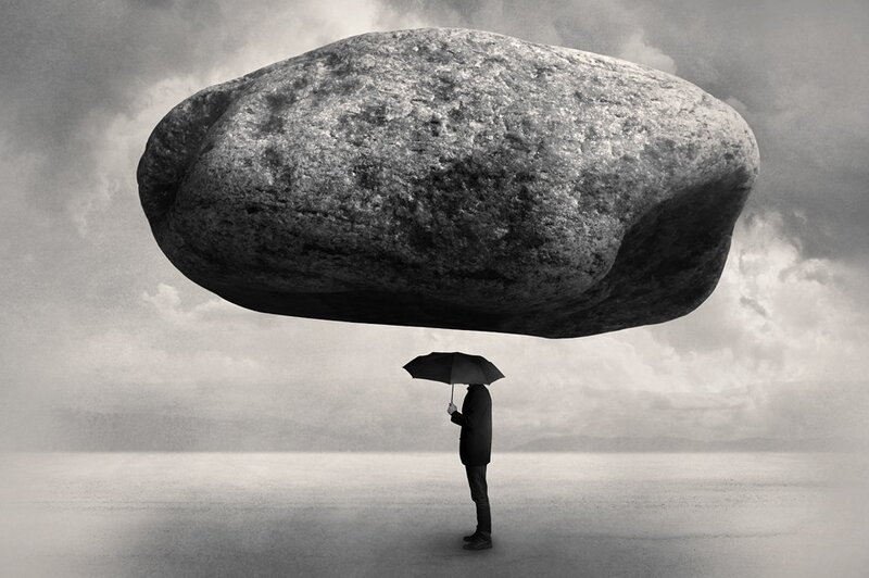 Person under Floating Rock