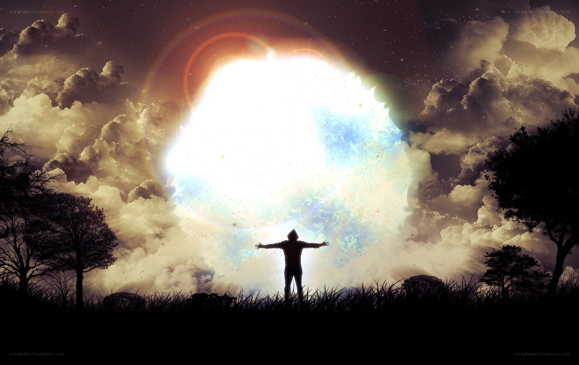 person under glowing sky