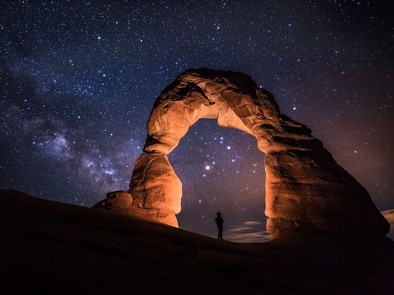 Person under Rock Arch — Black