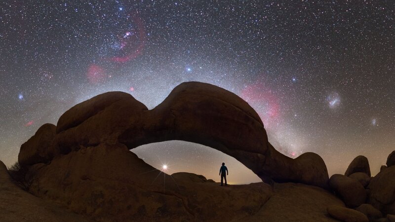 Person under Rock Arch — Brown