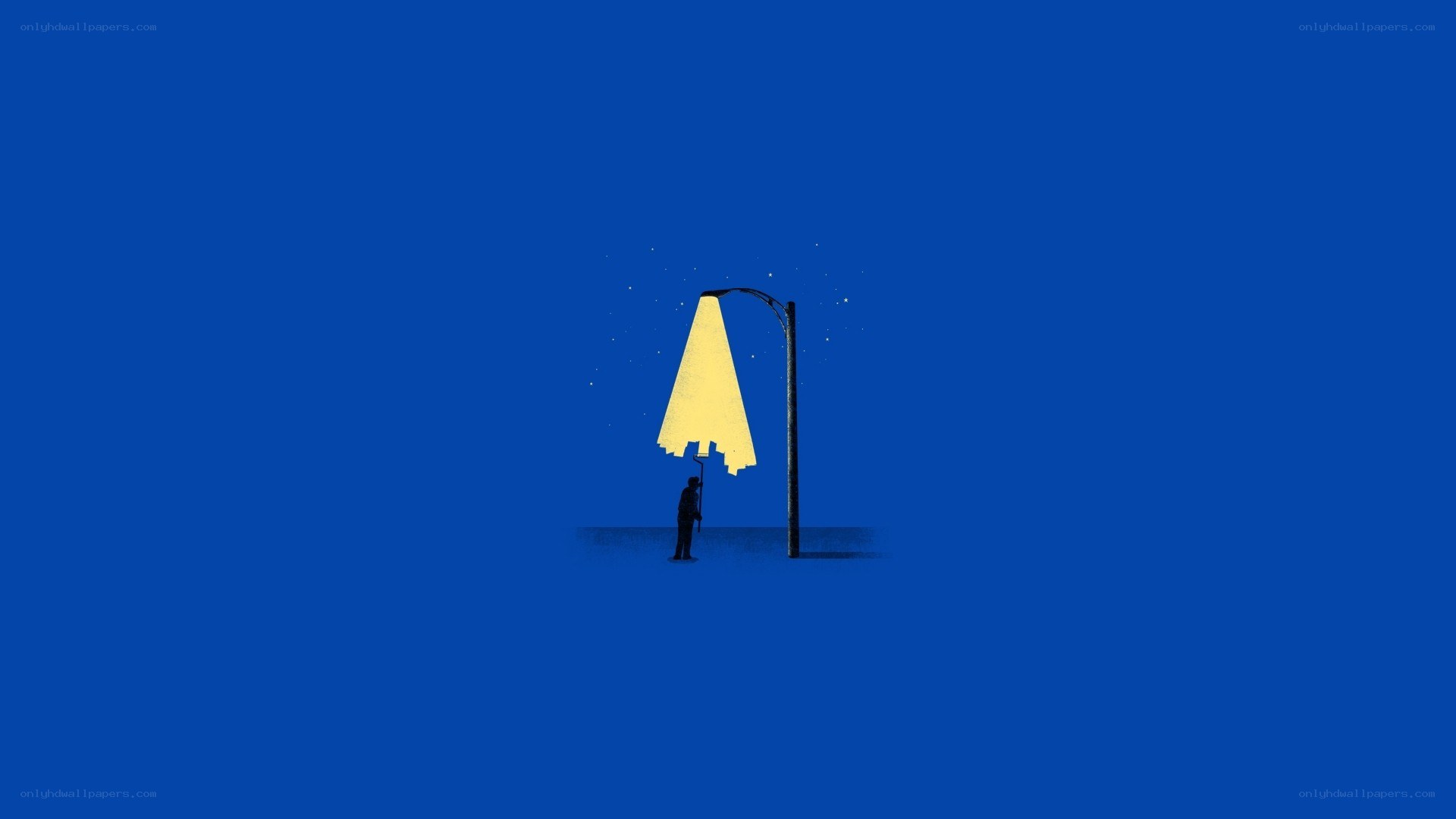 person under streetlight at night