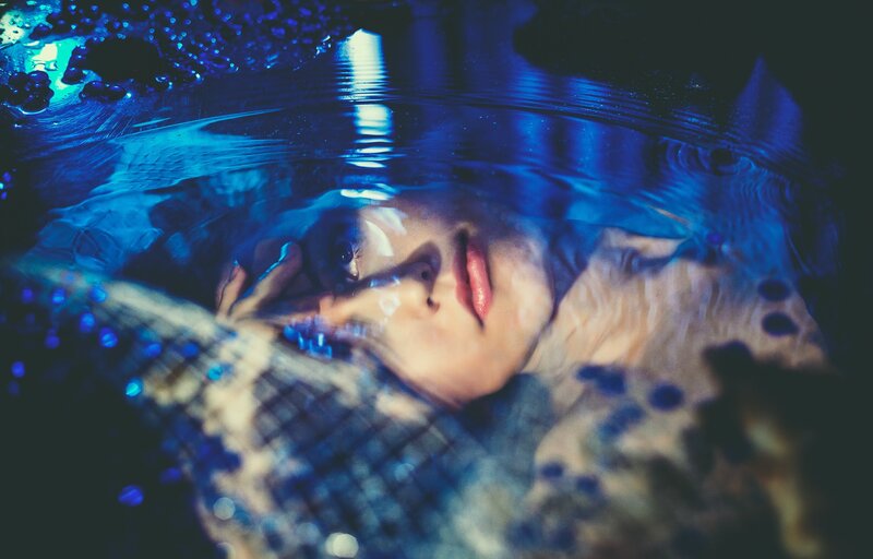 Person Underwater — Blue