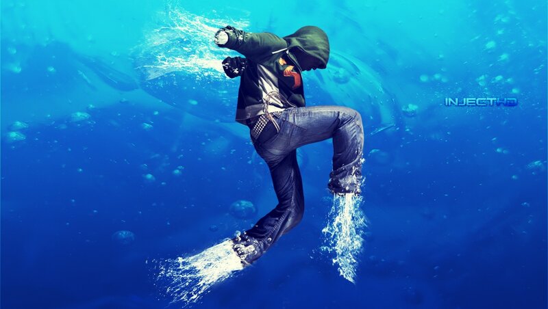 person underwater in hoodie