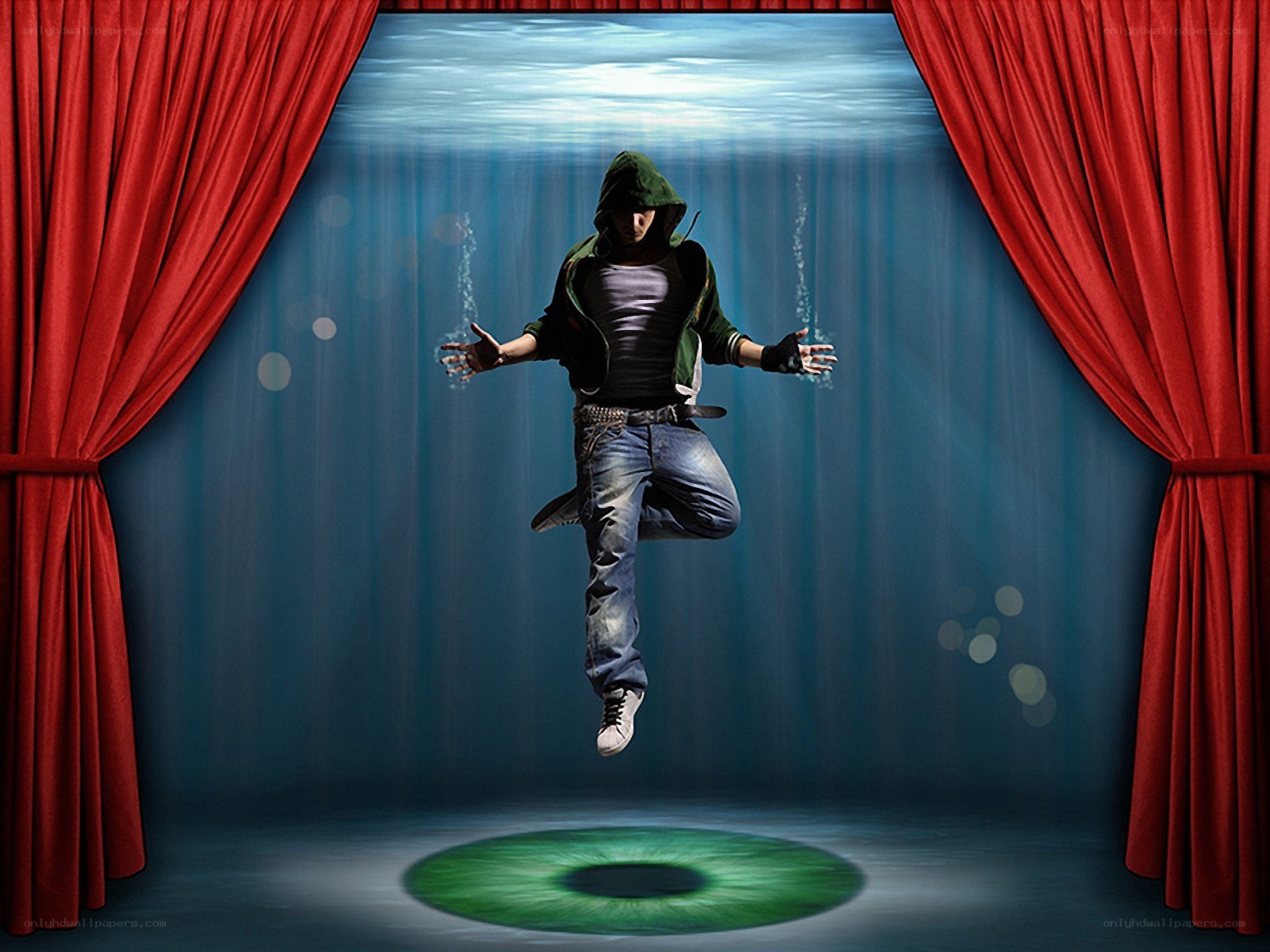 person underwater on stage