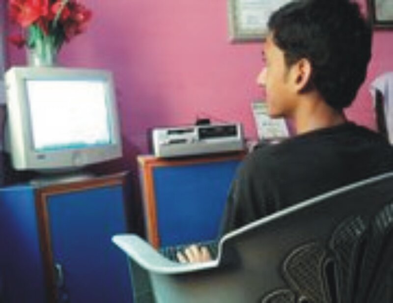 Person Using Computer — Pink