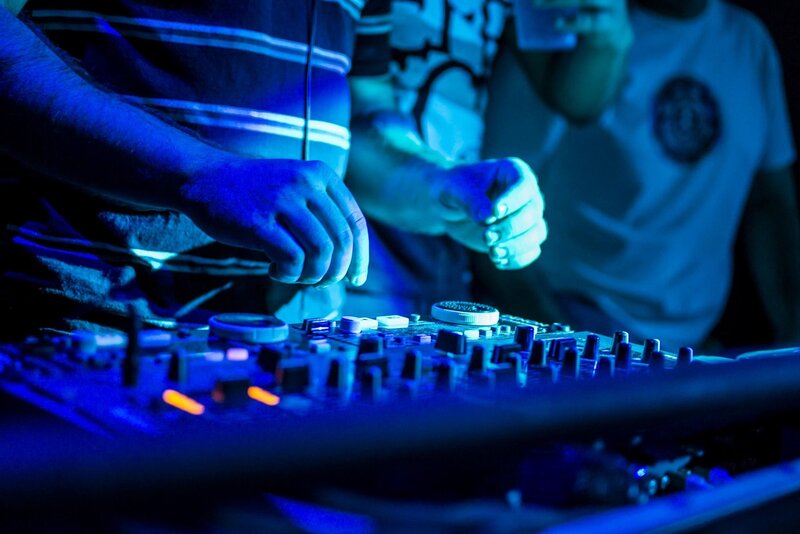 Person Using DJ Mixer