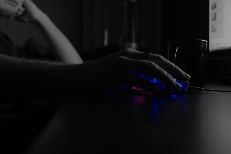 person using glowing mouse