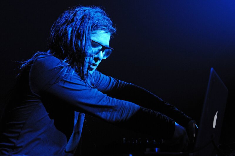 Person Using Laptop — Blue
