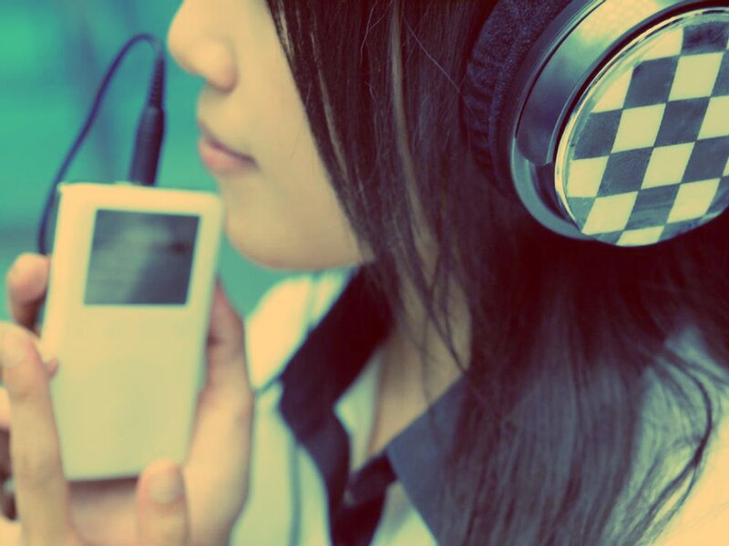 person using music player