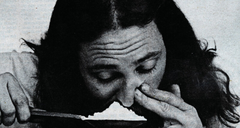 person using spoon to eat