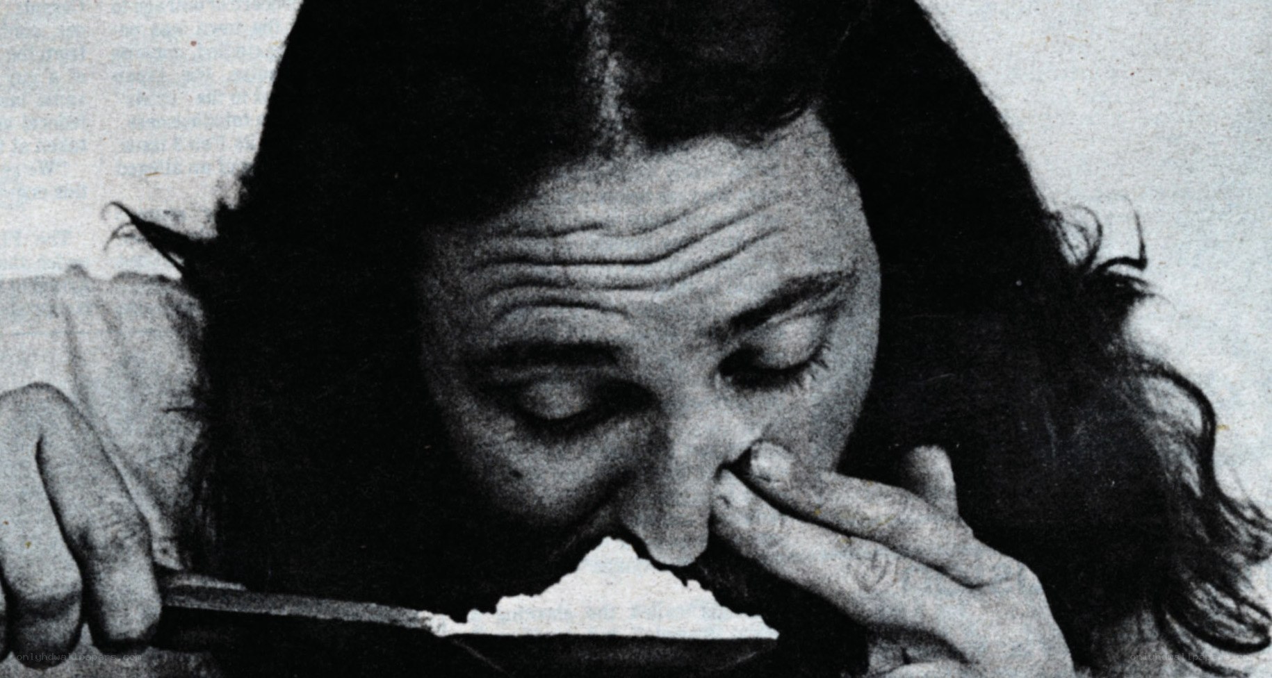 person using spoon to eat