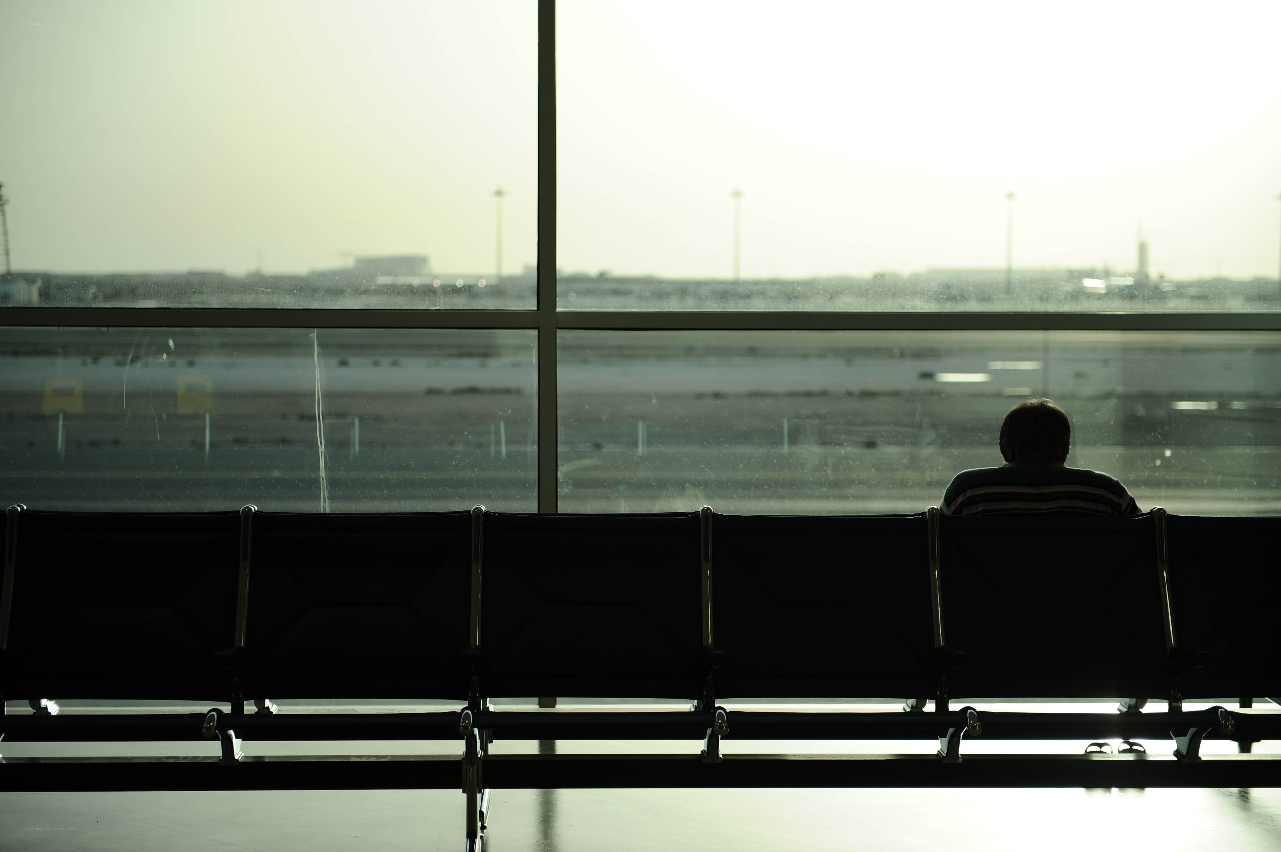 Person waiting at airport terminal
