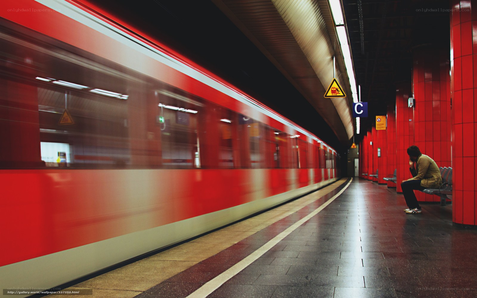 Person waiting at subway station