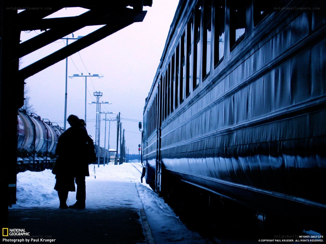 Person waiting at train station
