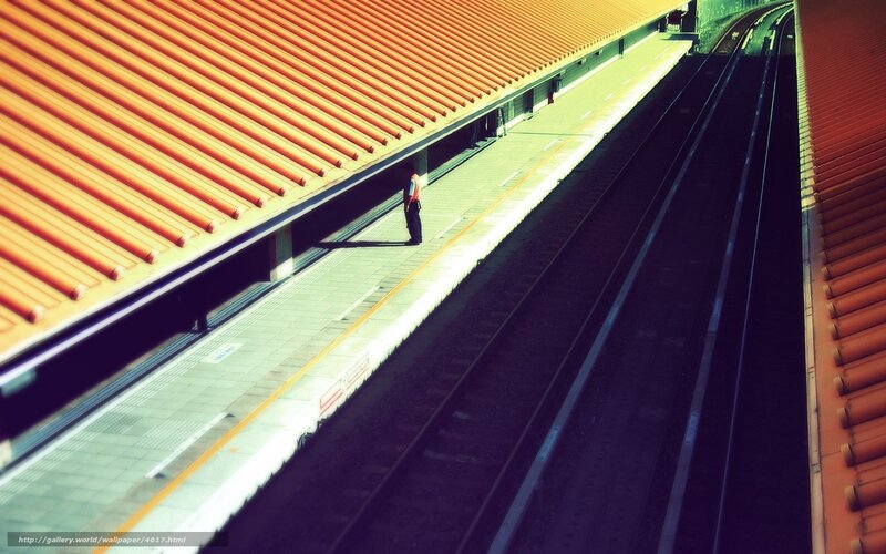 person waiting at train station
