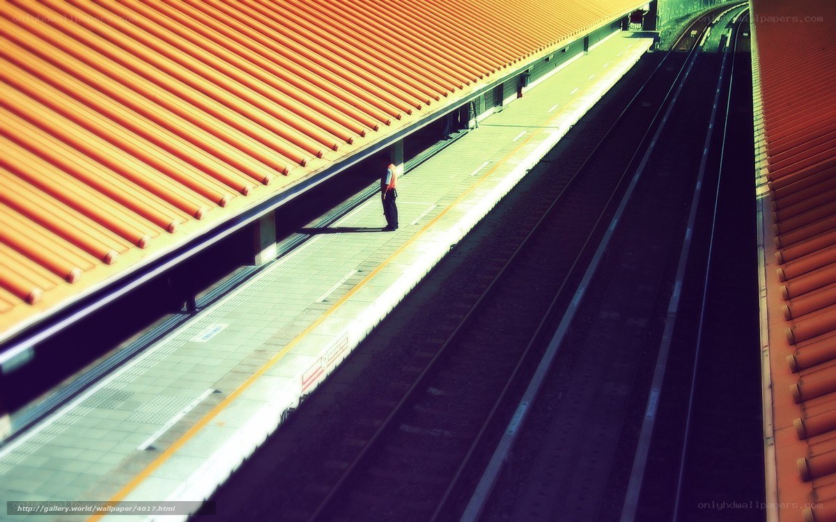 person waiting at train station