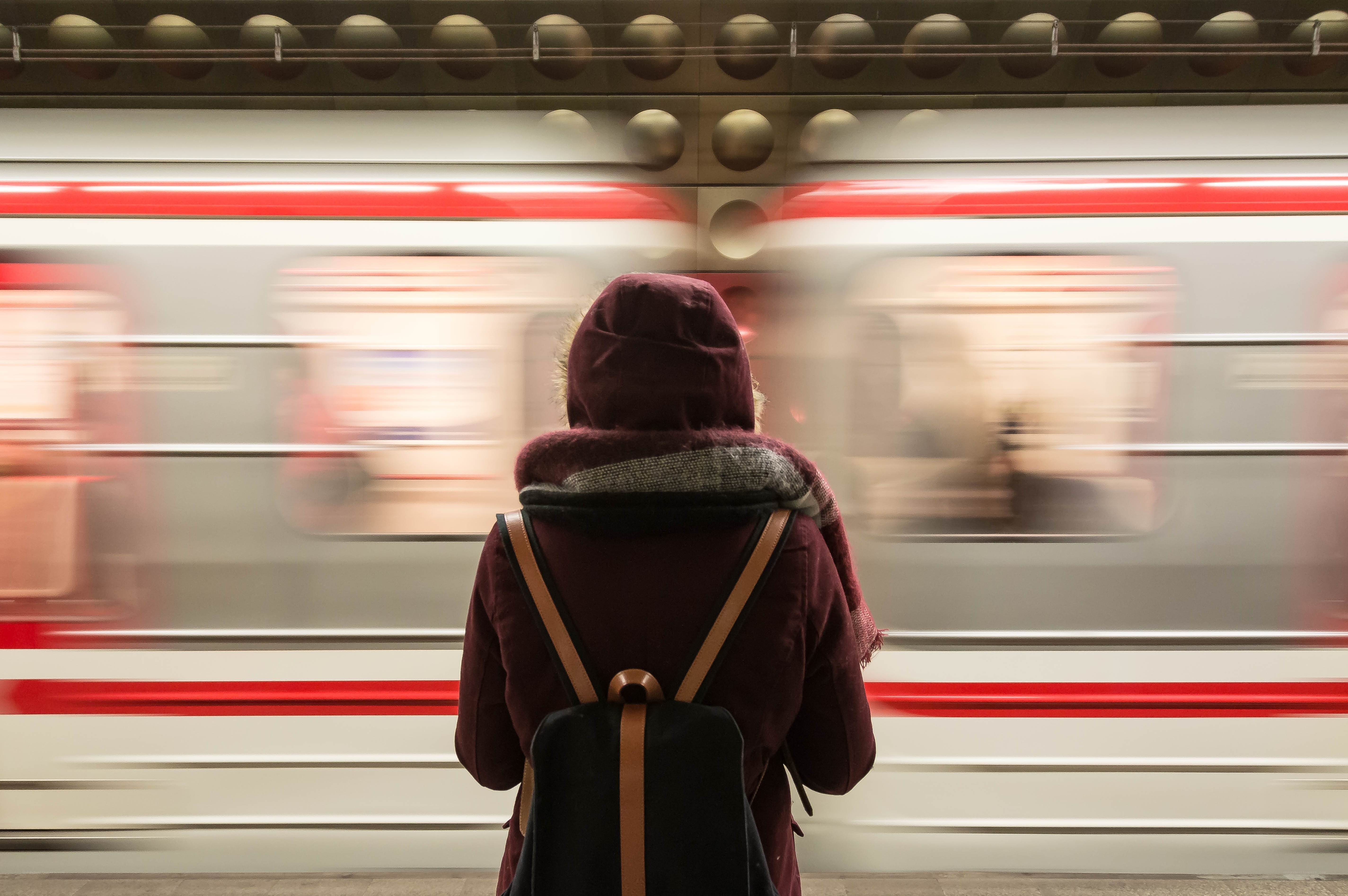 Person waiting for subway train