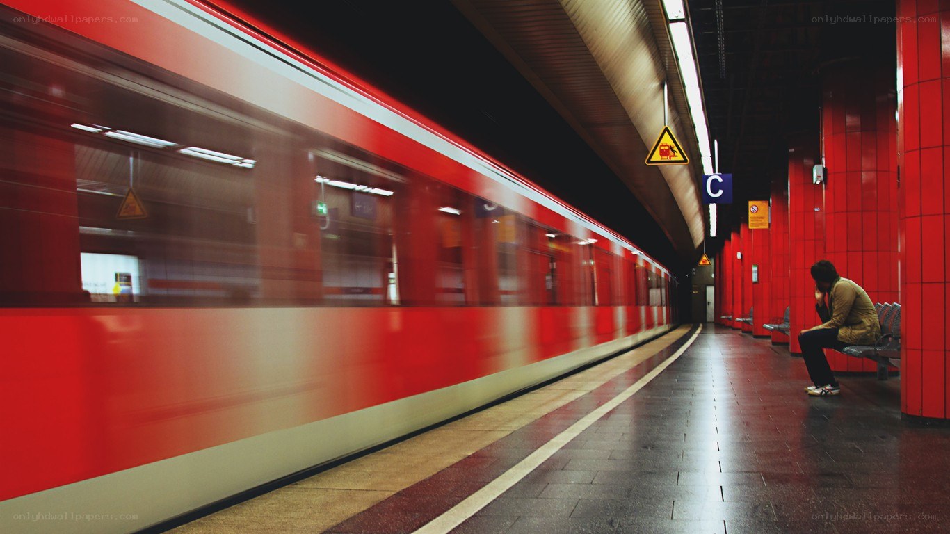Person waiting on subway platform