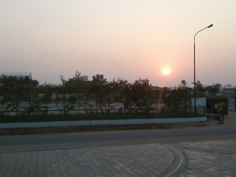 Person Walking at Sunset