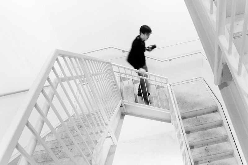 Person walking down stairs